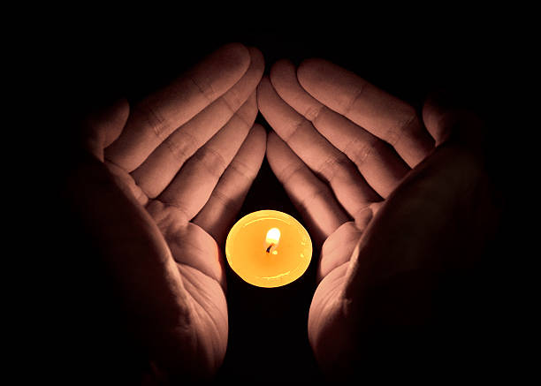 istock Candle in the hand, Hope concept 514685749
