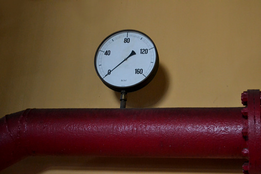 pressure gauge on heavy steel tube