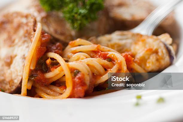 Spaghetti With A Slice Of Grilled Eggplant Stock Photo - Download Image Now - Backgrounds, Basil, Cheese