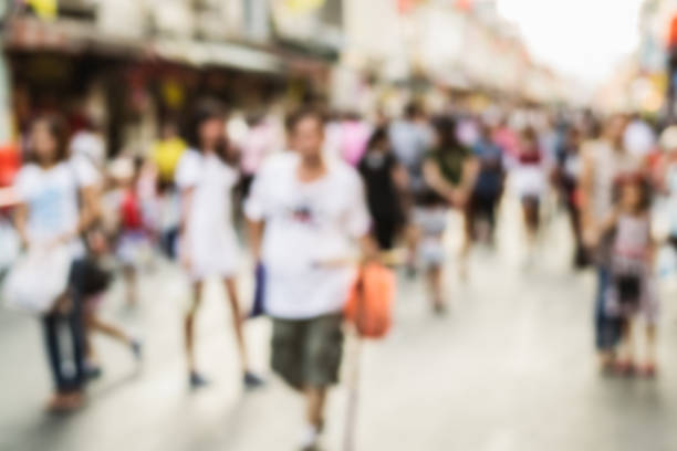 istock Blurred people walking on the street 514711172