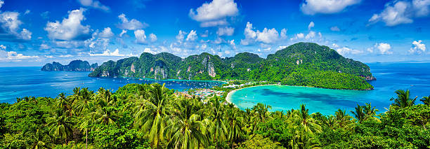 Panorama of tropical islands Panorama of tropical islands Phi Phi Don and Phi Phi Leh in sea. Crabi, Thailand phi phi islands stock pictures, royalty-free photos & images