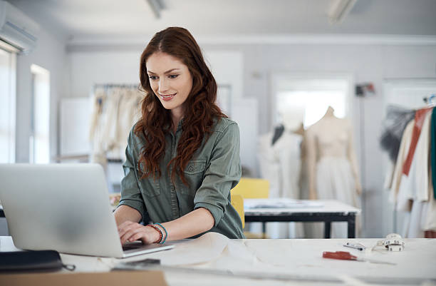 istock Putting her best selling designs online 514716608