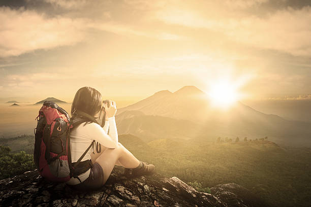 istock Traveler taking pictures on mountain 514717294