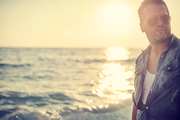 istock Portrait of old fashioned man at the beach 514719152