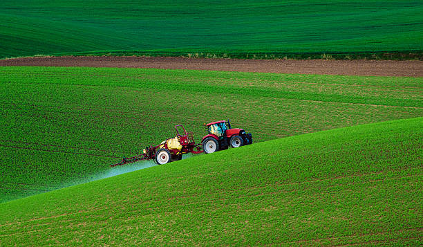 istock Farm machinery spraying insecticide 514719170