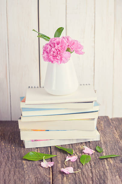 istock Pink pastel carnation flowers in white vase 514720386