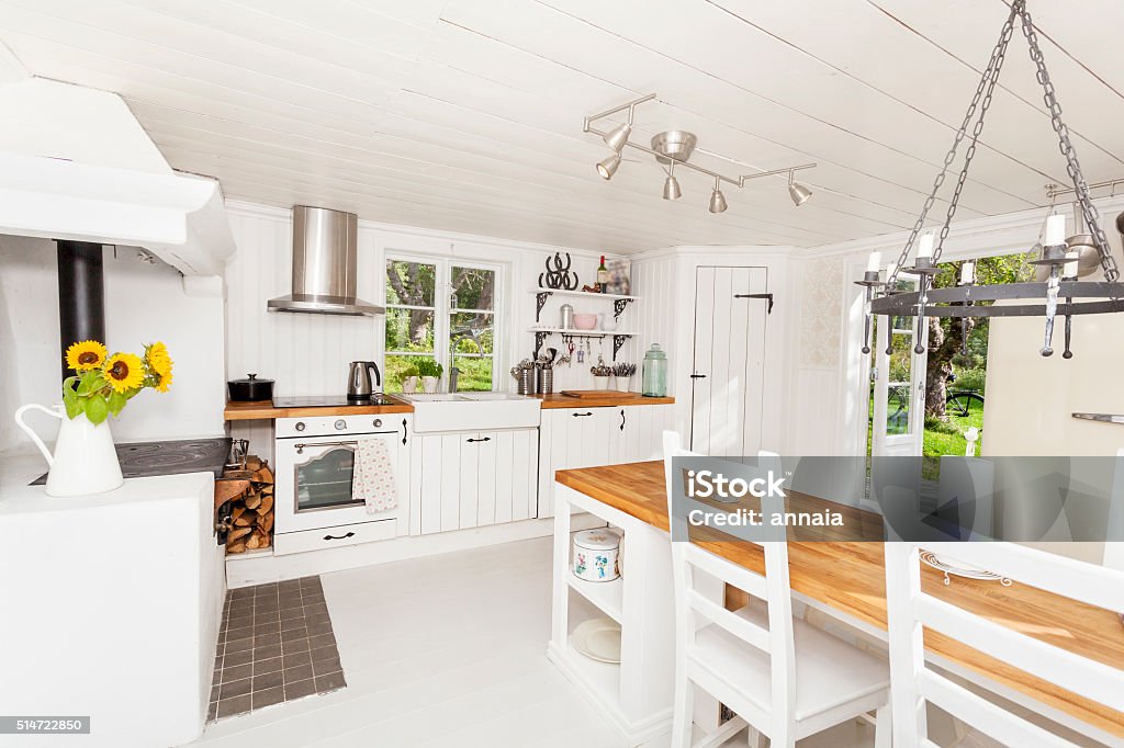 interior of a kitchen interior of a kitchen in country style  Kitchen Stock Photo