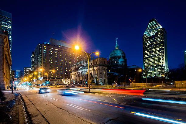 Mary, Queen of the World Cathedral in Montreal, Canada People and traffic outside Mary, Queen of the World Cathedral in Montreal, Canada. mary queen of the world cathedral stock pictures, royalty-free photos & images