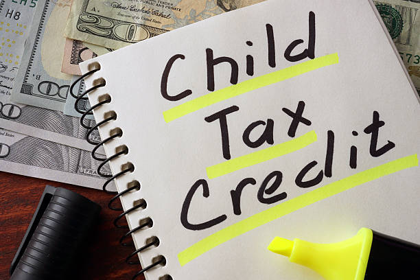 istock Notebook with child tax credit  sign on a table. 514724910