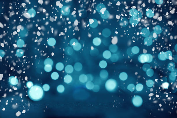 istock Blue Christmas Bokeh Lights and Snow 514725277