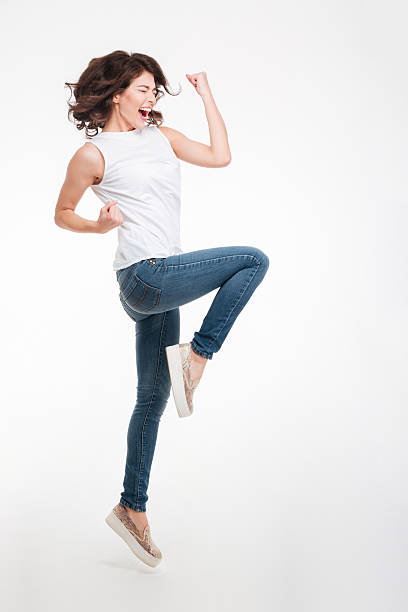 istock Cheerful woman celebrating her success 514725504