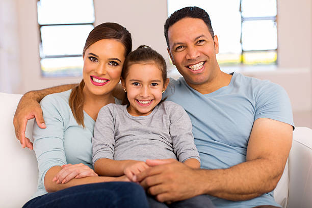 istock family relaxing at home 514728520