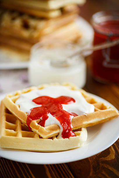 istock Viennese waffles with yogurt and strawberry jam 514729174