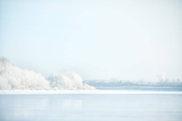 istock frozen river and trees in hoarfrost 514729694