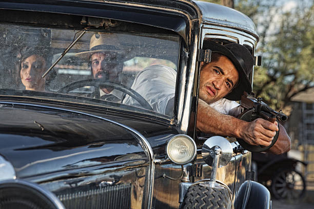 istock 1920s Gangster Drive By Shooting 514729823
