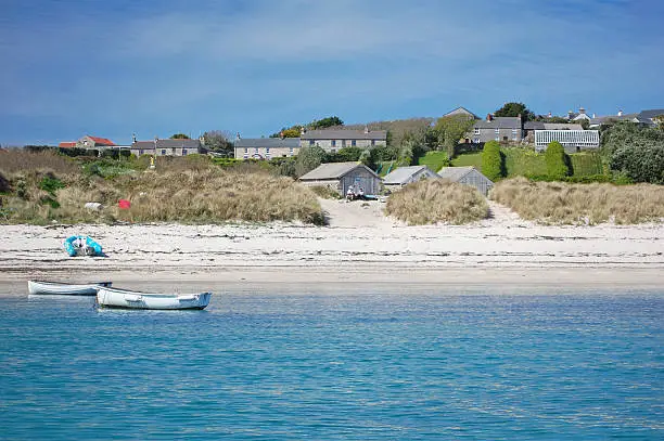view of beach and houses on st martin's, isles of scilly