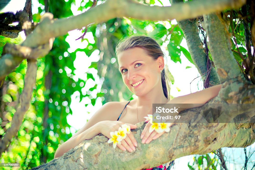 Woman with tropic flowers Adult Stock Photo