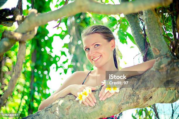 Woman With Tropic Flowers Stock Photo - Download Image Now - Adult, Adults Only, Alternative Therapy