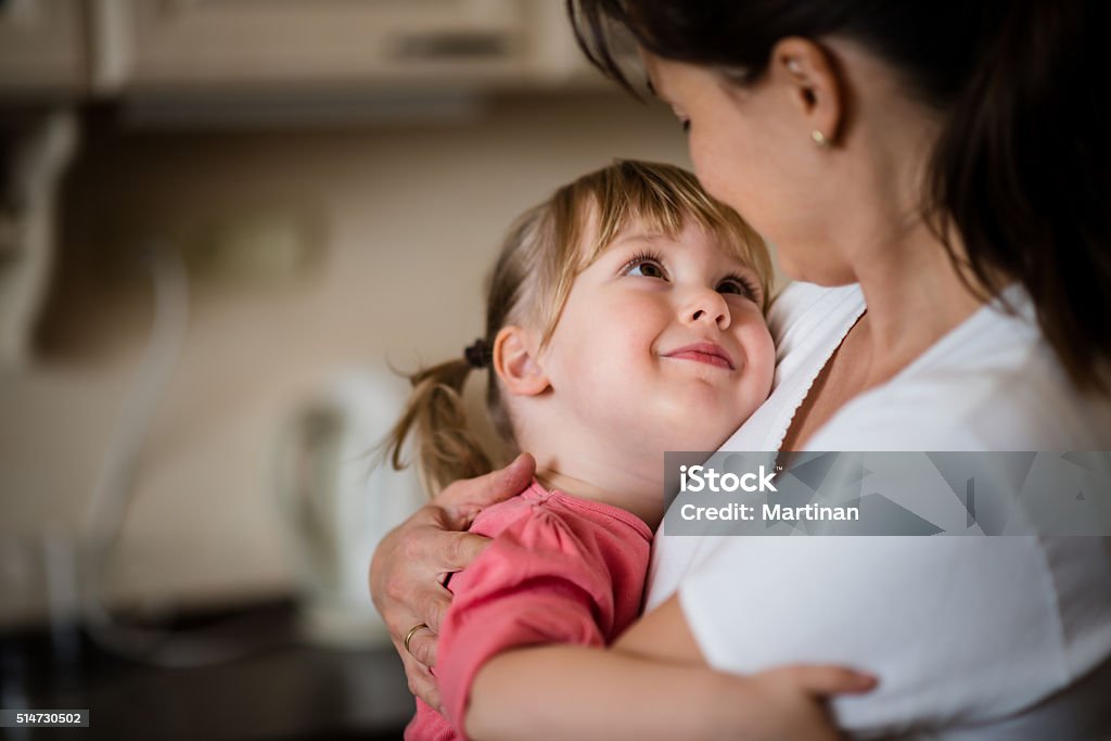 I love you Mother and daughter embracing indoors at home Baby - Human Age Stock Photo