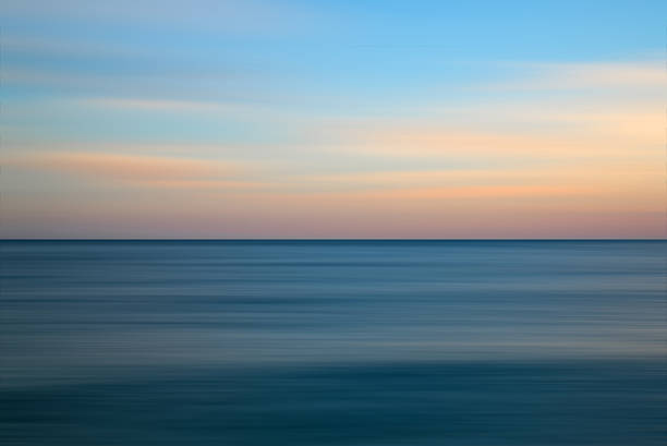 istock Stunning long exposure seascape image of calm ocean at sunset 514731255