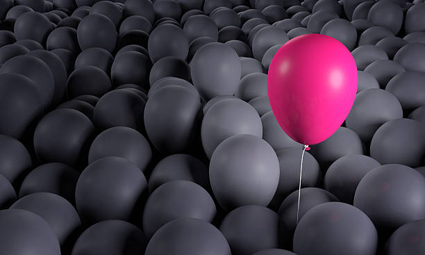 istock Purple pink balloon rising from anonymous crowd: individuality, standing out 514732388