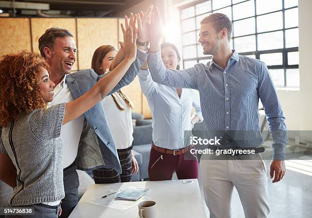 High Five Stock Photo - Download Image Now - Cheering, Teamwork, Dedication