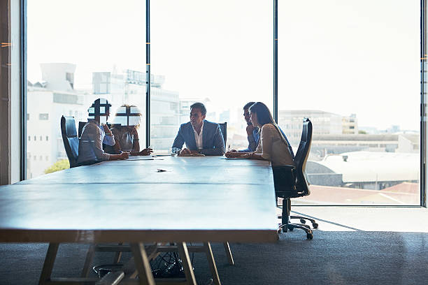 istock Going over their plan of action in the boardroom 514738068
