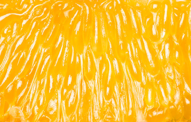 fond orange macro - pulpe photos et images de collection