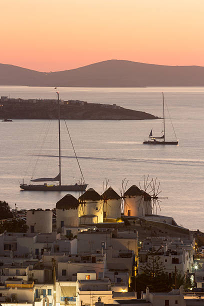 The sun sets over Mykonos Town in the Cyclades