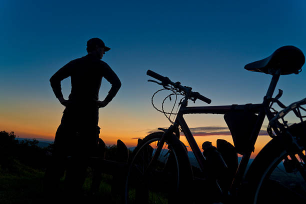 istock Silhouette of Guy Looking Sunset 514757305