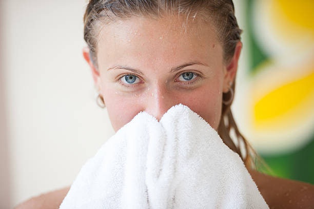 Woman holding towel