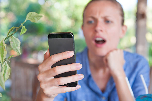 istock Woman looking at smart phone 514757803