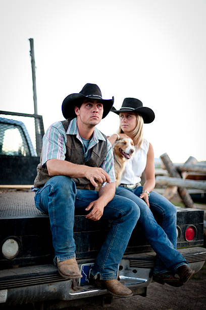 istock Horse herders on pick-up tailgate 514758005