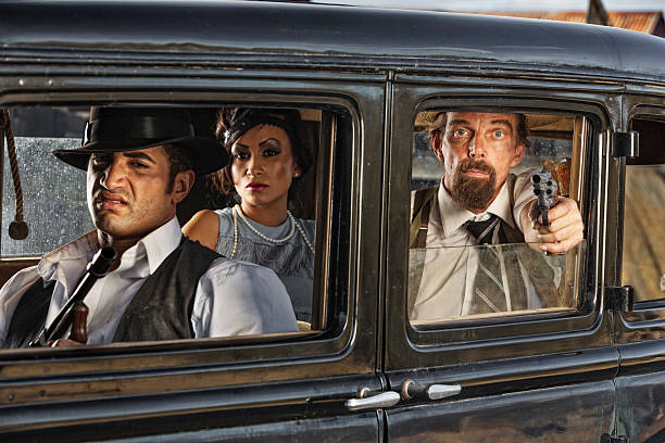 istock 1920s Era Gangsters Drive By 514758031