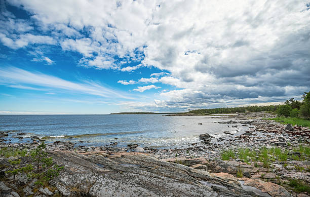 istock Rocky coastline with grass between the boulders 514758249