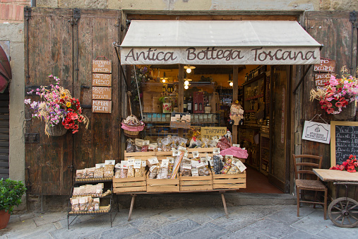 Italy, Arezzo - August 19, 2014: Antique grocery shop exposing colorful pastas and local products.
