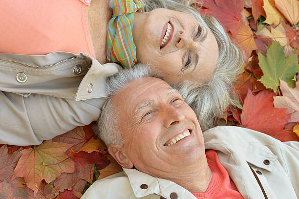 istock Senior couple in autumn park 514769288