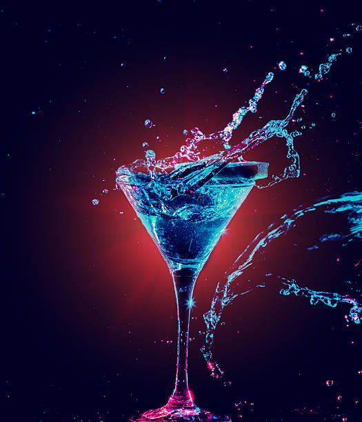 Colourful cocktail in glass with splash