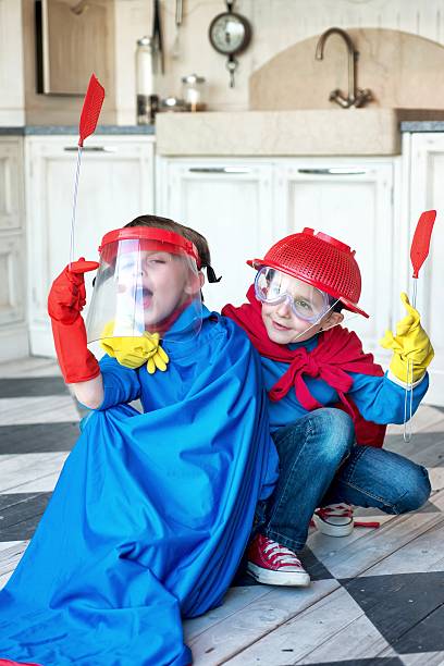 小さな スーパー ヒーロー のキッチン - superhero child creativity little boys ストックフォトと画像