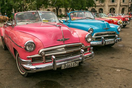 havana, Сuba - January 19, 2016: old historical american cars are parked at street of havana cuba