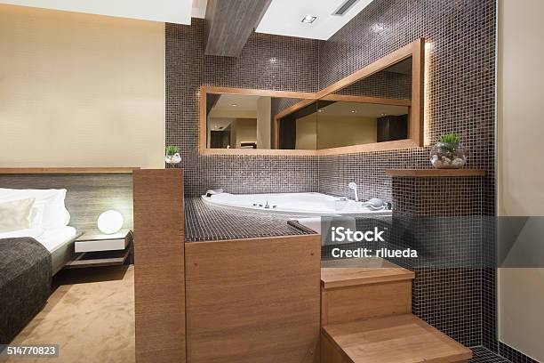 Modern Open Hot Tub In Bedroom Stock Photo - Download Image Now - Accessibility, Bathroom, Bathtub