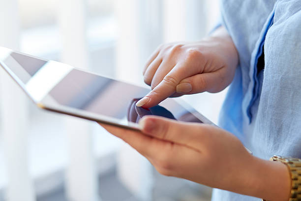 istock Woman with digital tablet 514771174