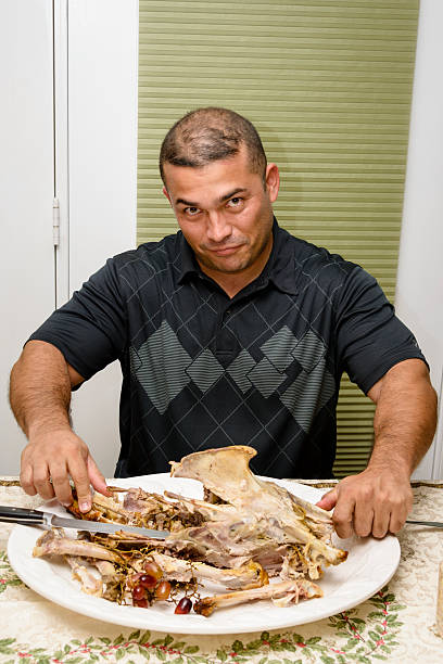istock Man can't believe he ate a whole turkey 514773005