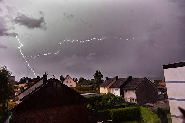 Thunder, lightnings and rain during summer storm at night.