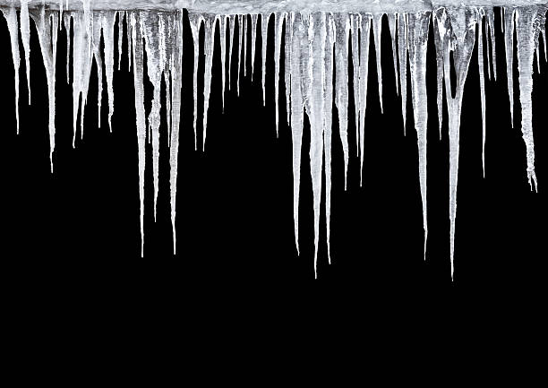 Icicles Icicles on a black background icicle photos stock pictures, royalty-free photos & images