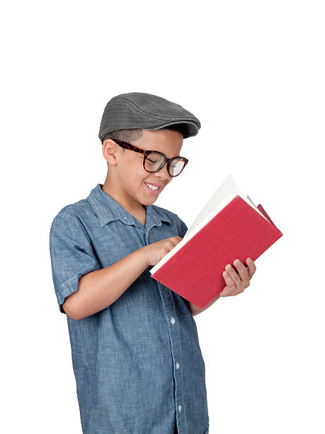 Boy with book smiling stock photo