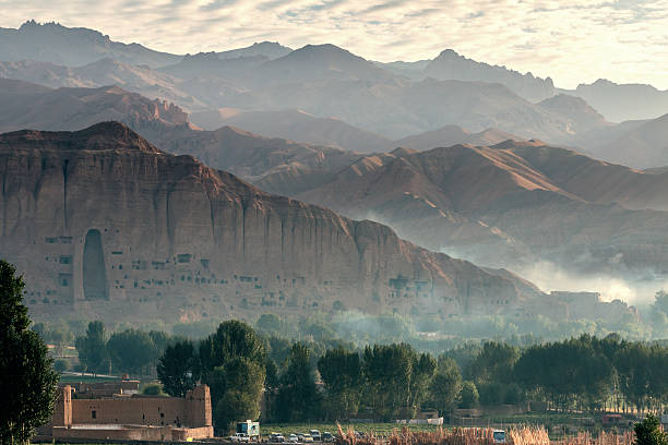 view of bamiyan valley - afghanistan valley, landscape, buddhist, afghan, afghanistan, buddha, bamiyan afghanistan landscape bamyan province stock pictures, royalty-free photos & images