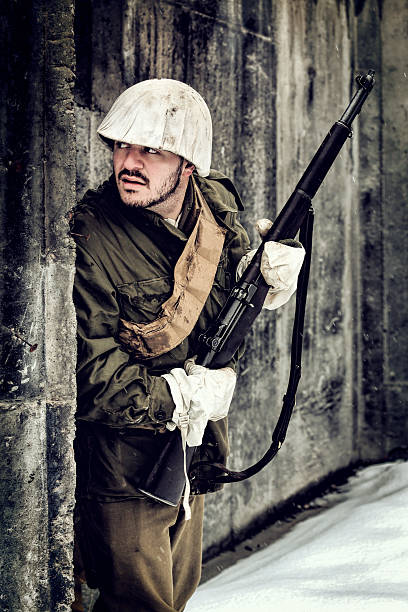 istock WWII Winter Soldier with Rifle 514776392