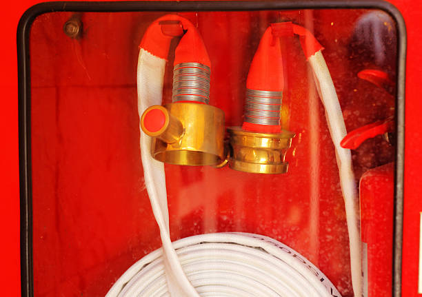 Pipe roll for fire hose emergency in red metal boxes