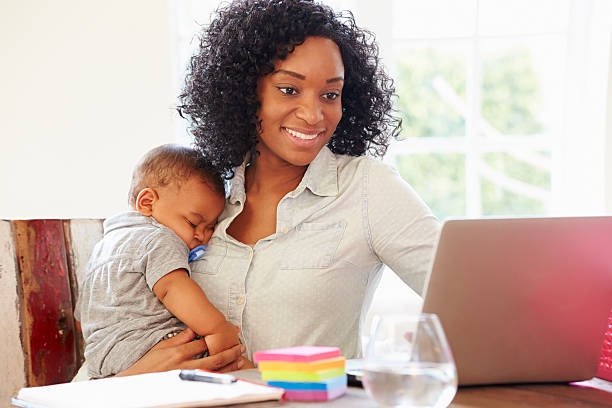 istock Mother With Baby Working In Office At Home 514777743